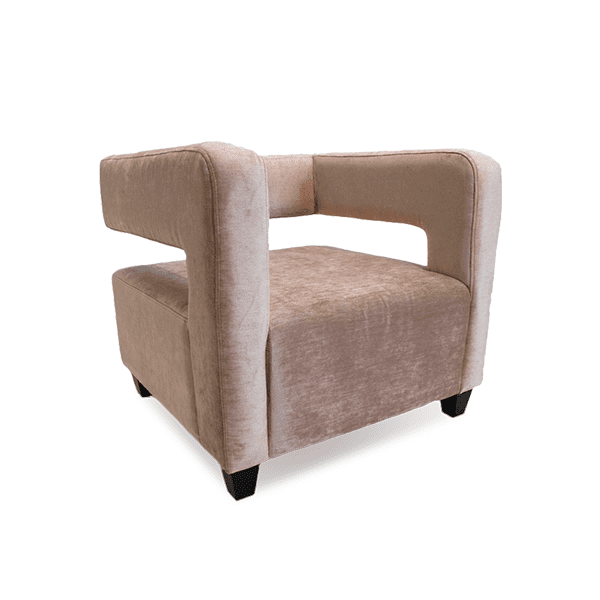 baby pink velevet lounge chair with exposed back