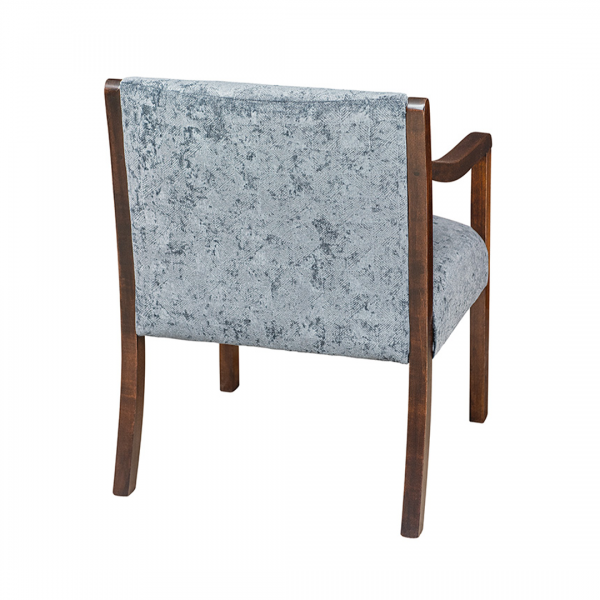 back of wood chair with velvet upholstery