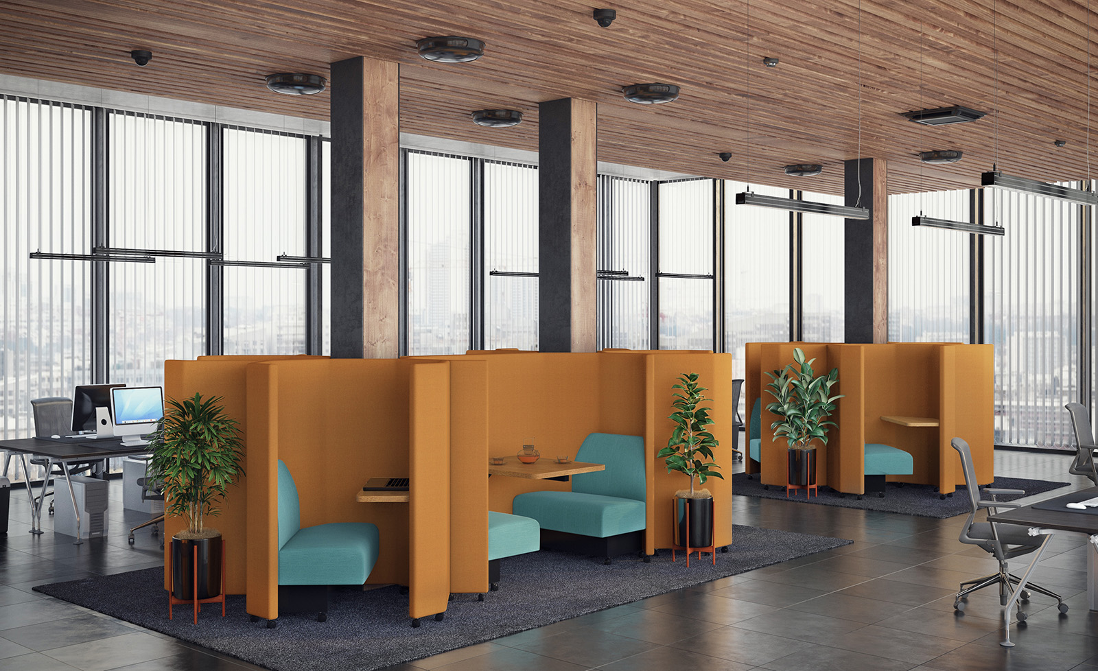 honeycomb seating pods with built-in tables and wall in office environment