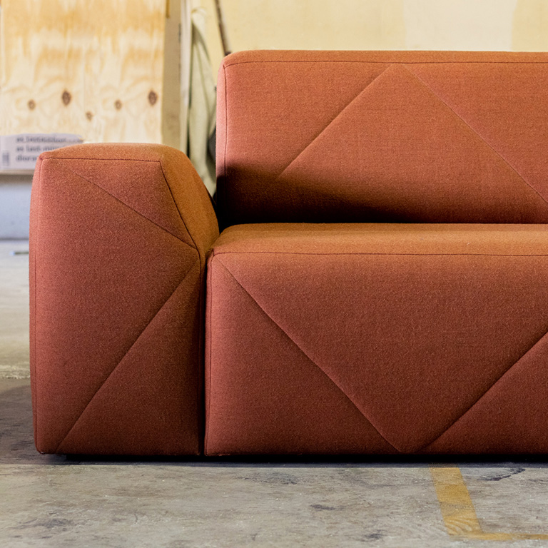 custom geometric tufting on commercial sofa